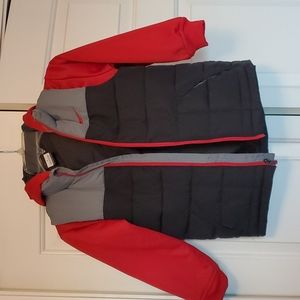 Boy's Nike jacket looks like a vest, but it's just a just all in one.